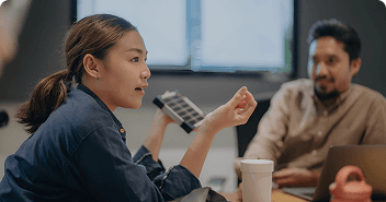 People discussing in a meeting